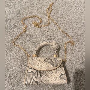 Elegant Snake Print Mini Bag with Gold Chain
New Without Tags ..never use